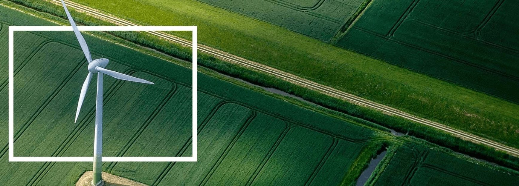 Windmill in field